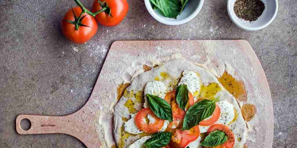 beatiful pizza on the pizza peel