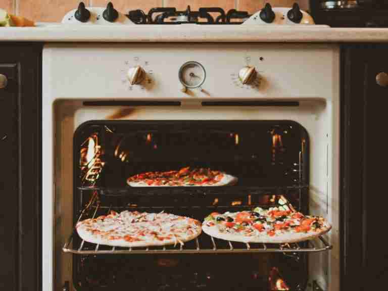 Getting-pizza-ready-in-a-retro-oven
